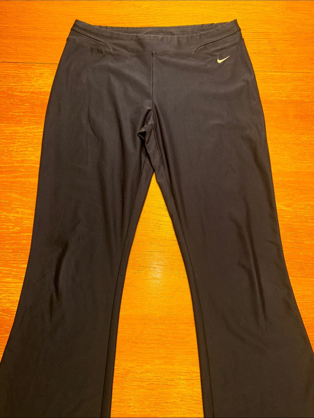 Nike Black Flared Leggings with Gold Swoosh